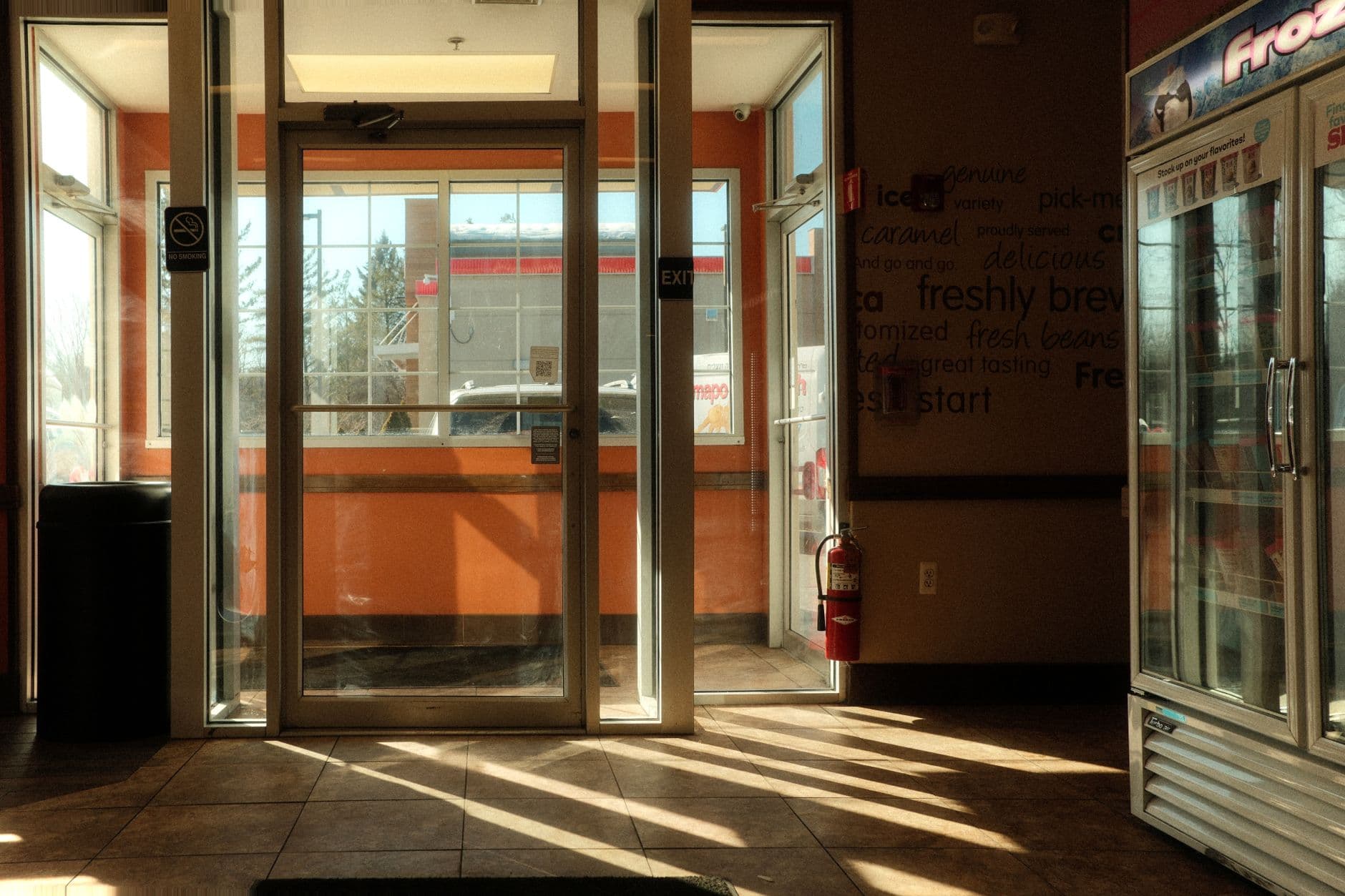 Glass entrance doors of a convenience store